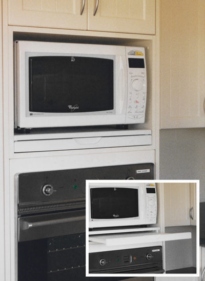 a microwave shelf, a 598mm microwave stealth shelf installed in an oven tower